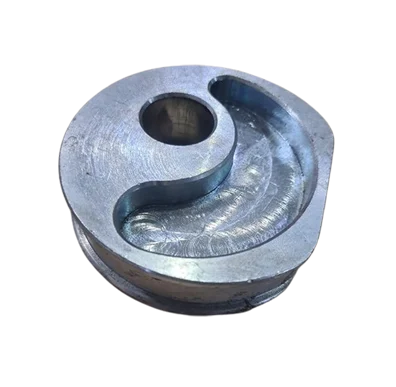 Milled cam plate with curved profile slot and bore
